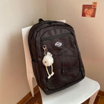 Mochila Fashion Urbana Impermeable con Llavero Pompón y Compartimento para Laptop