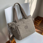 Bolso Bobo mediano en tela mojada