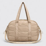 Bolso puffer con neceser
