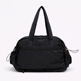 Bolso puffer con neceser