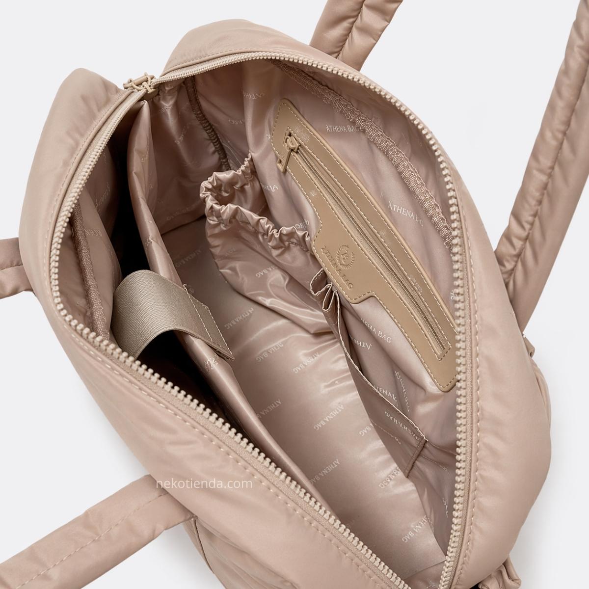 Bolso puffer con neceser