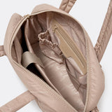 Bolso puffer con neceser