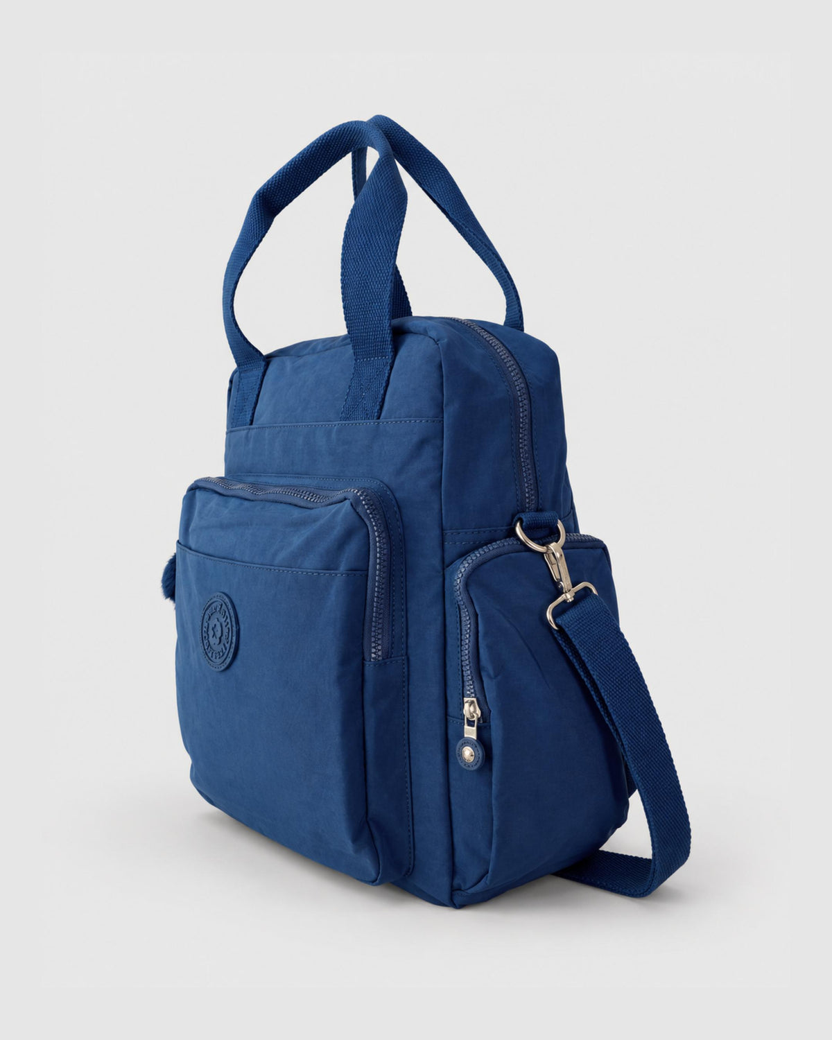 Bolso mochila 3 en 1 de tela nylon con textura de tela mojada, estructurada. Con espacio para laptop de 15.6" 