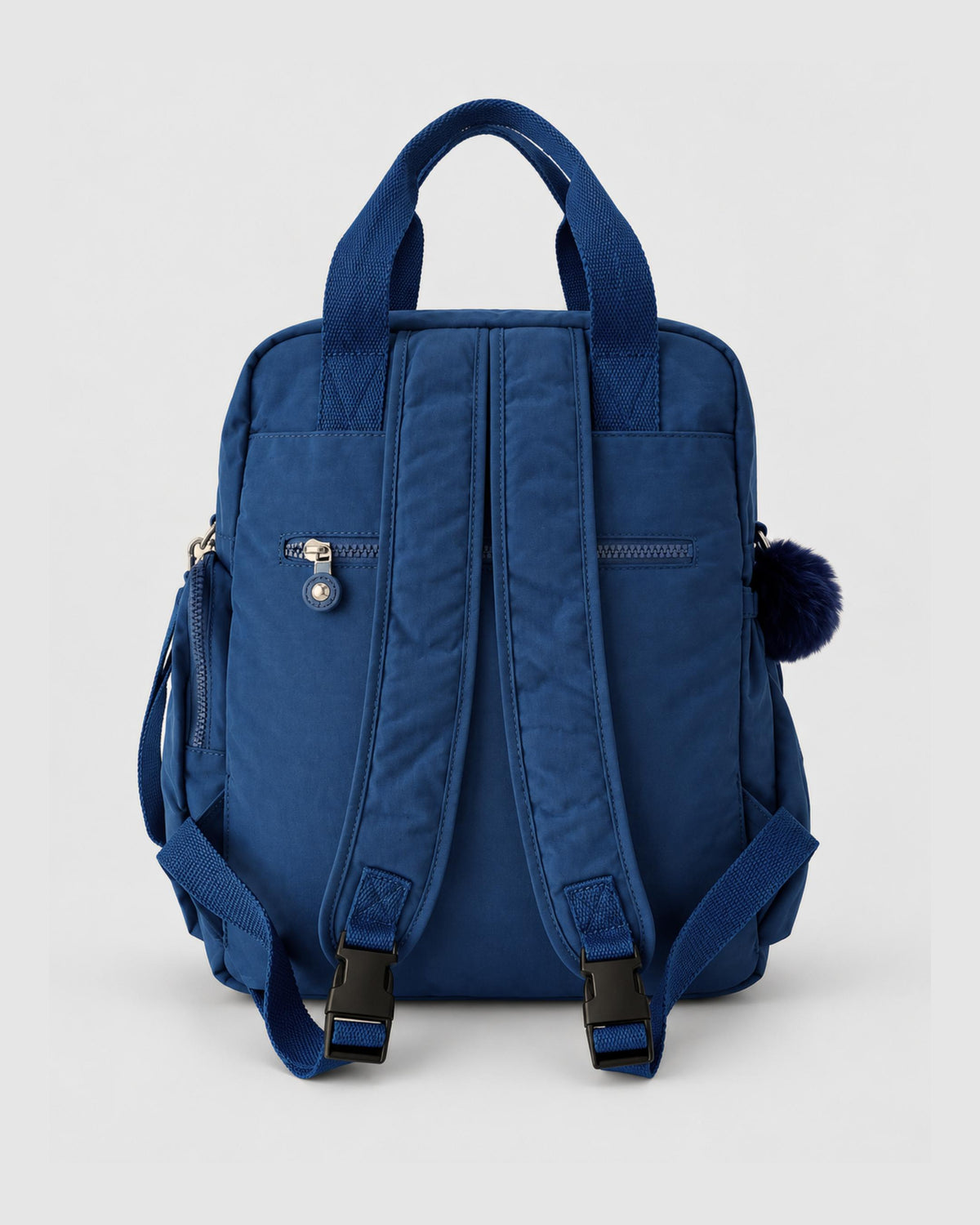 Bolso mochila 3 en 1 de tela nylon con textura de tela mojada, estructurada. Con espacio para laptop de 15.6" 