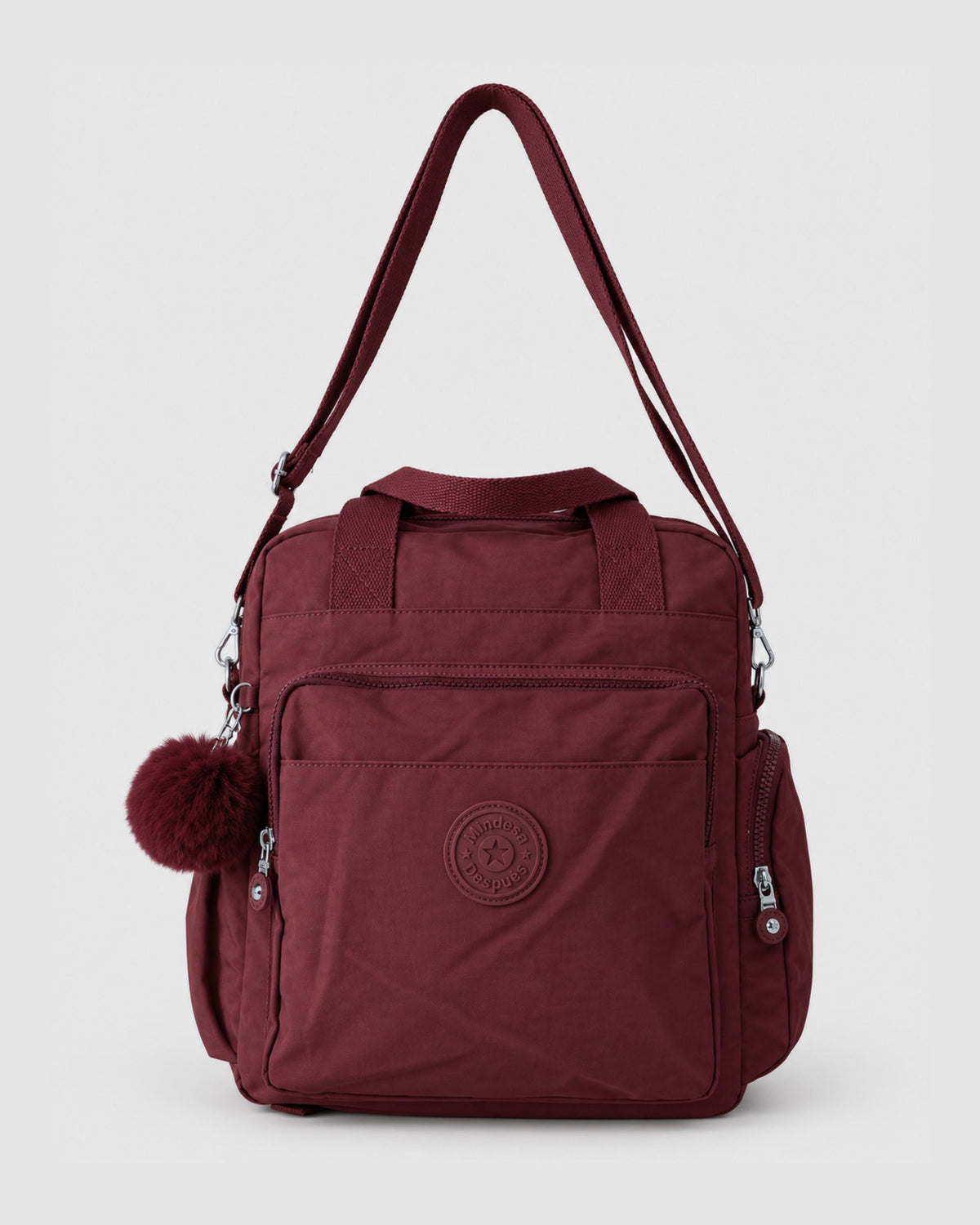Bolso mochila 3 en 1 de tela nylon con textura de tela mojada, estructurada. Con espacio para laptop de 15.6" 