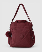 Bolso mochila 3 en 1 de tela nylon con textura de tela mojada, estructurada. Con espacio para laptop de 15.6" 