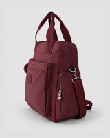 Bolso mochila 3 en 1 de tela nylon con textura de tela mojada, estructurada. Con espacio para laptop de 15.6" 