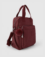 Bolso mochila 3 en 1 de tela nylon con textura de tela mojada, estructurada. Con espacio para laptop de 15.6" 