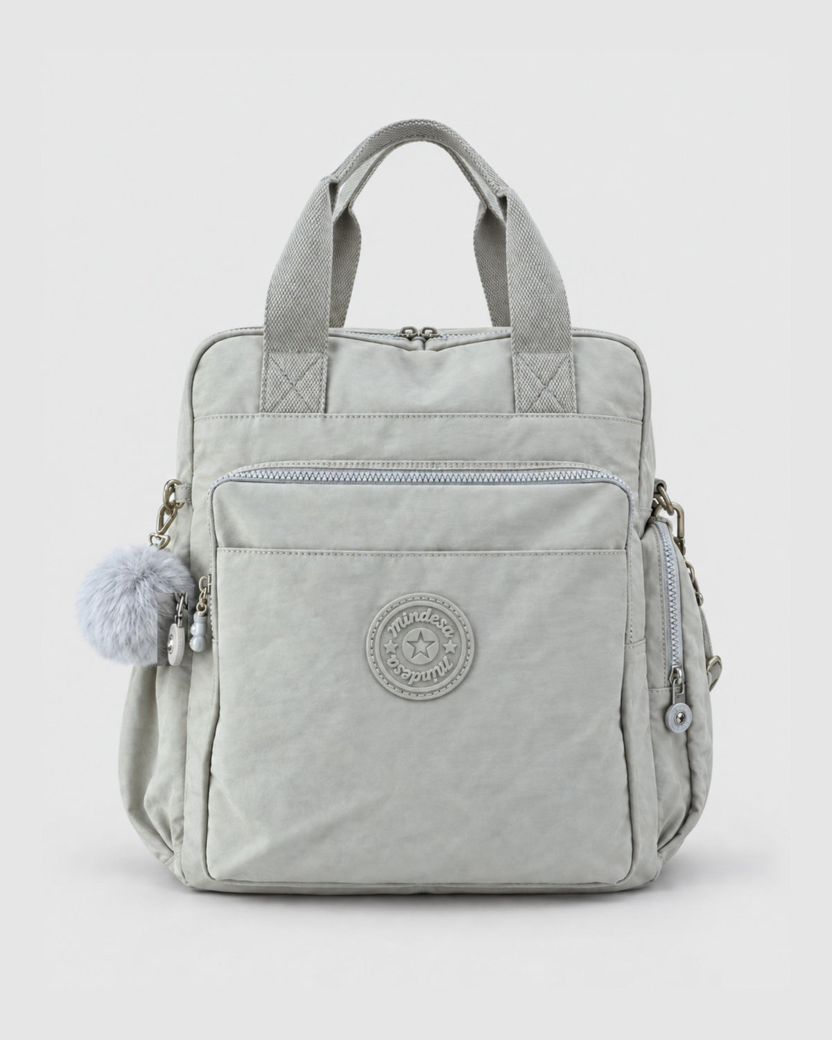 Bolso mochila 3 en 1 de tela nylon con textura de tela mojada, estructurada. Con espacio para laptop de 15.6" 