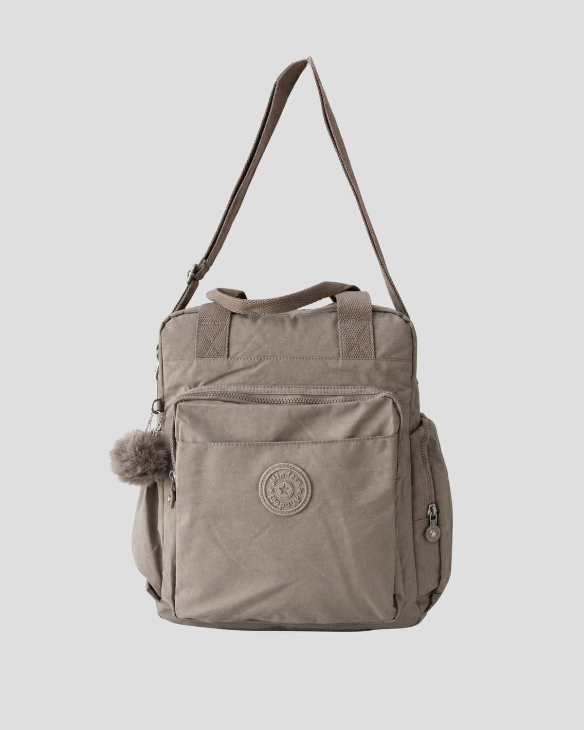 Bolso mochila 3 en 1 de tela nylon con textura de tela mojada, estructurada. Con espacio para laptop de 15.6" 