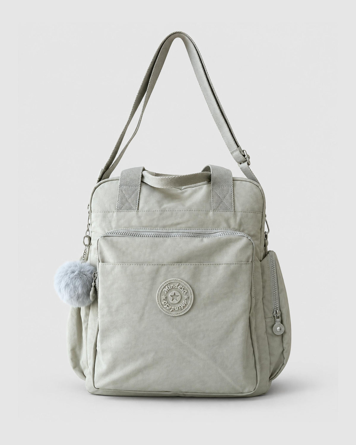 Bolso mochila 3 en 1 de tela nylon con textura de tela mojada, estructurada. Con espacio para laptop de 15.6" 
