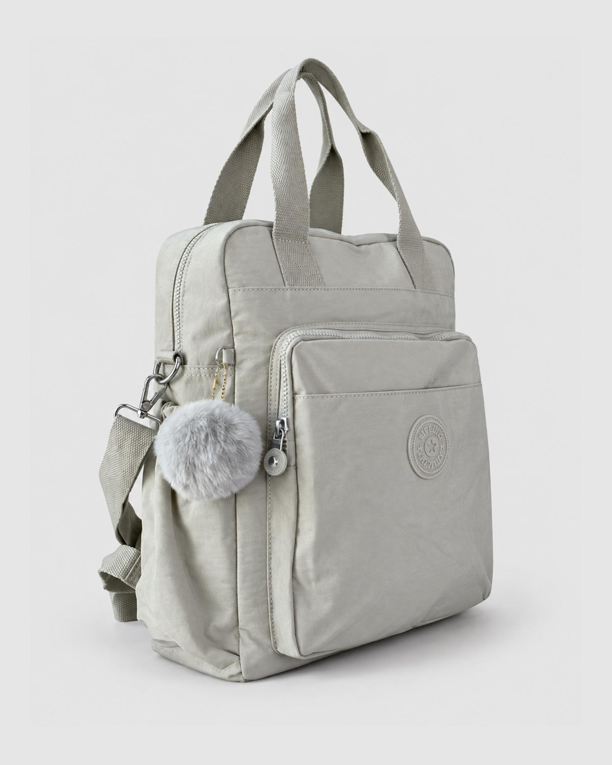 Bolso mochila 3 en 1 de tela nylon con textura de tela mojada, estructurada. Con espacio para laptop de 15.6" 