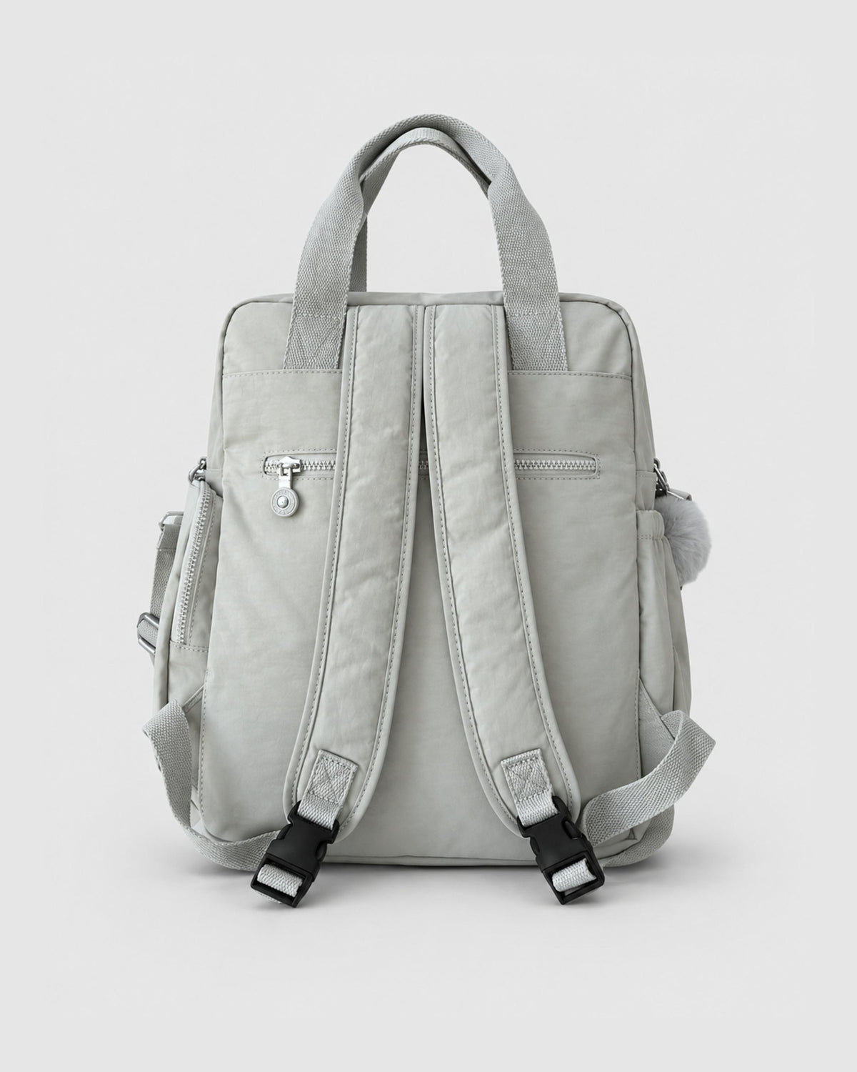 Bolso mochila 3 en 1 de tela nylon con textura de tela mojada, estructurada. Con espacio para laptop de 15.6" 