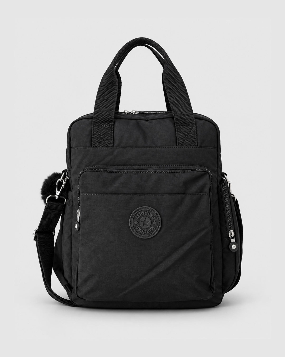 Bolso mochila 3 en 1 de tela nylon con textura de tela mojada, estructurada. Con espacio para laptop de 15.6" 