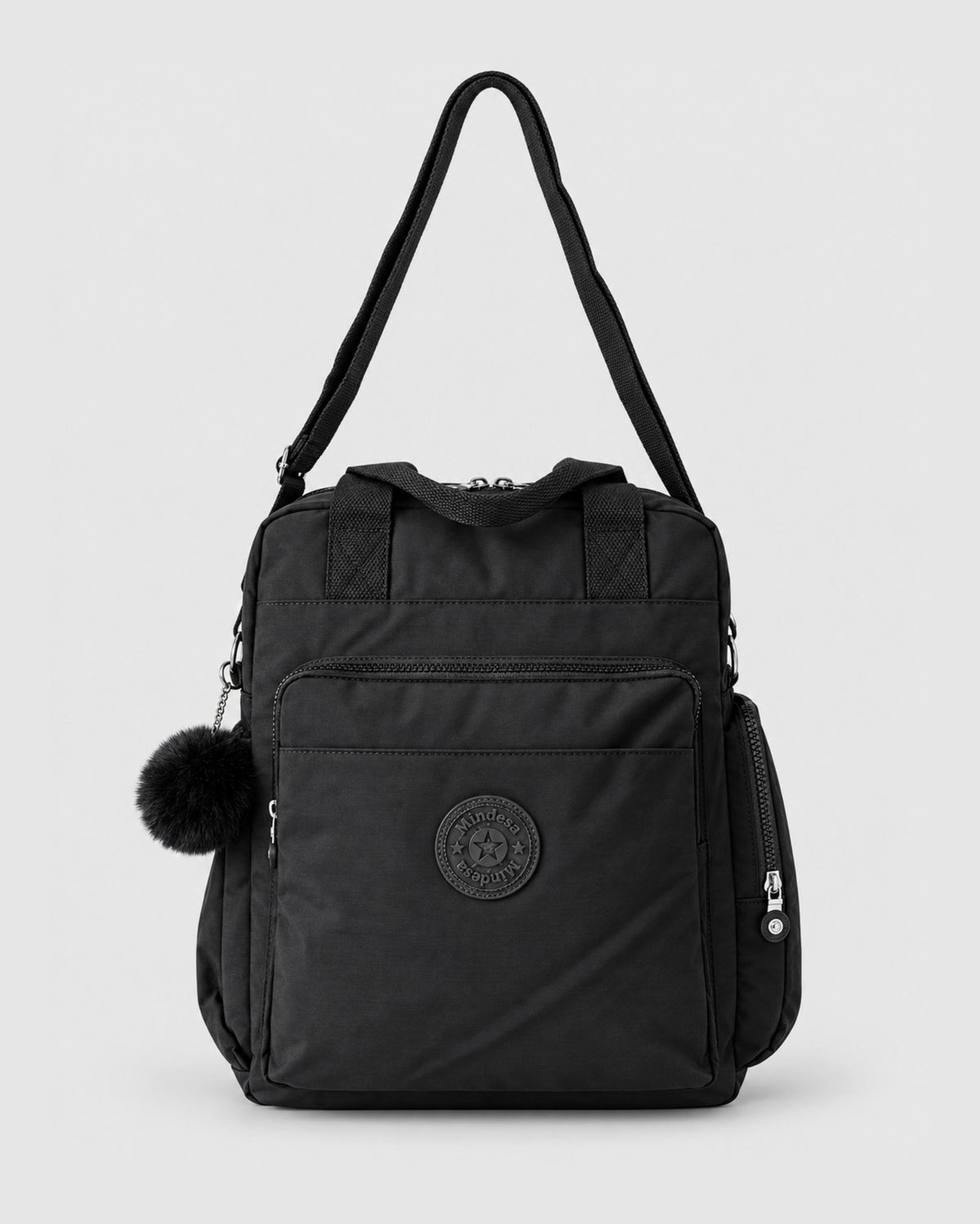 Bolso mochila 3 en 1 de tela nylon con textura de tela mojada, estructurada. Con espacio para laptop de 15.6" 