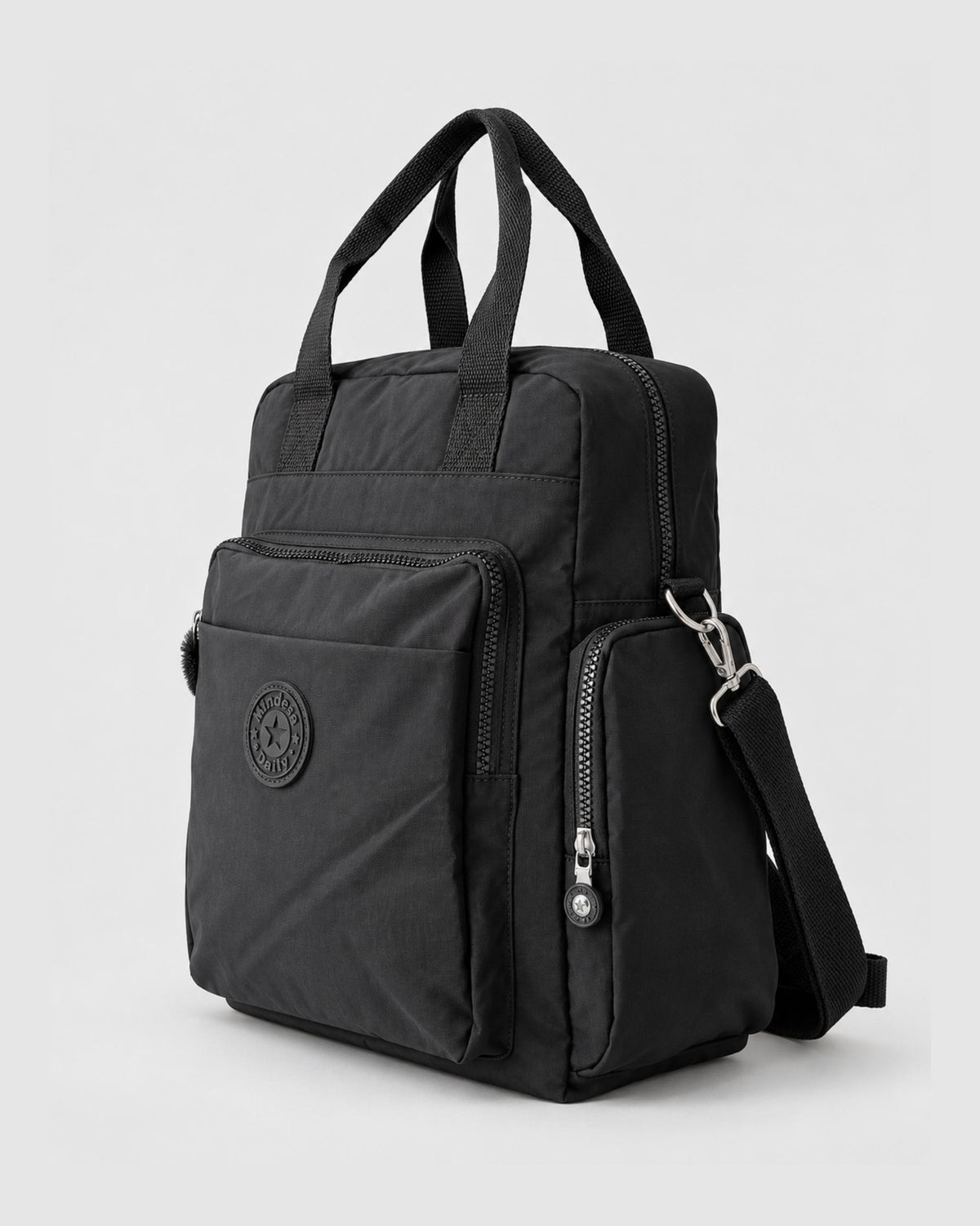 Bolso mochila 3 en 1 de tela nylon con textura de tela mojada, estructurada. Con espacio para laptop de 15.6" 