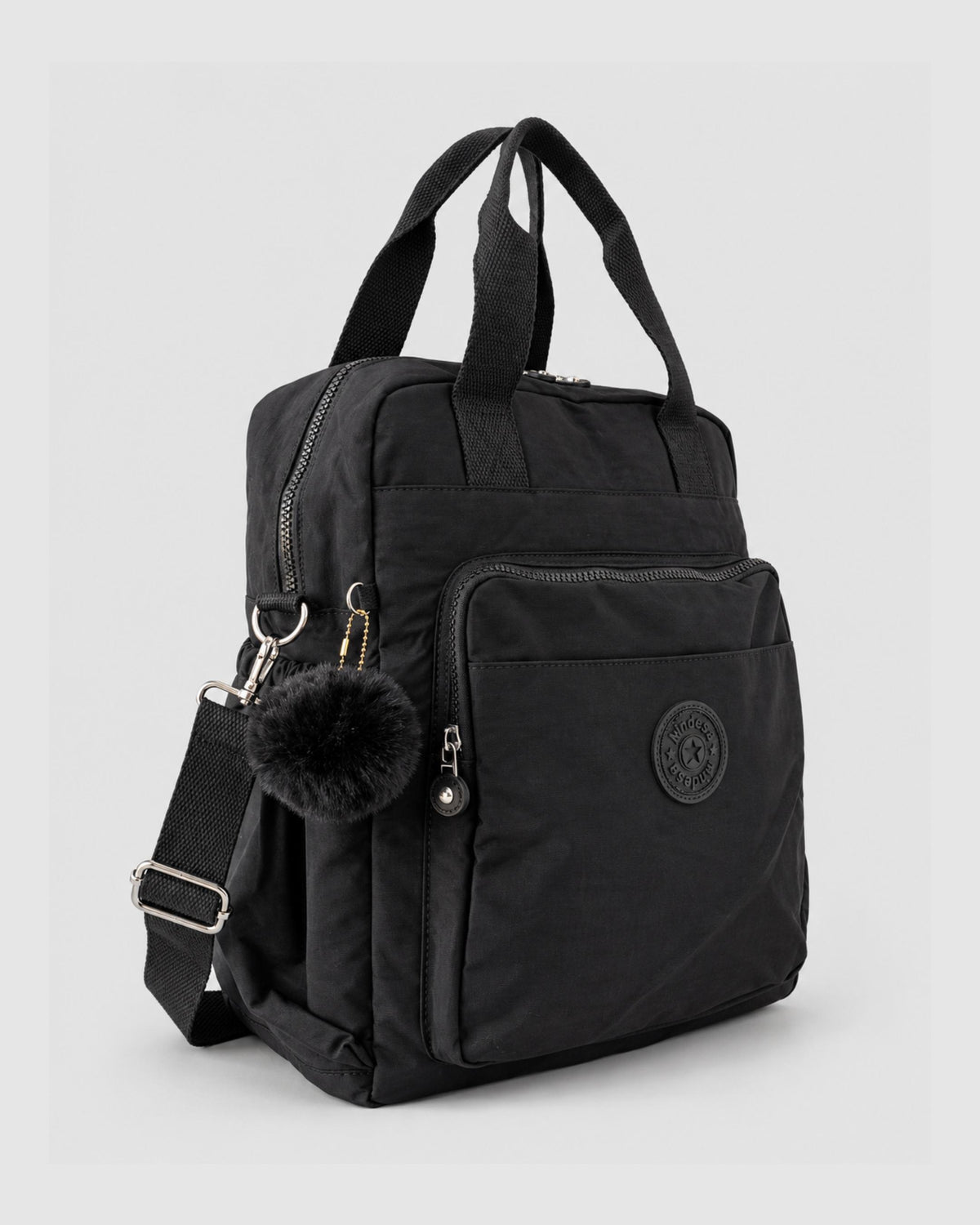 Bolso mochila 3 en 1 de tela nylon con textura de tela mojada, estructurada. Con espacio para laptop de 15.6" 