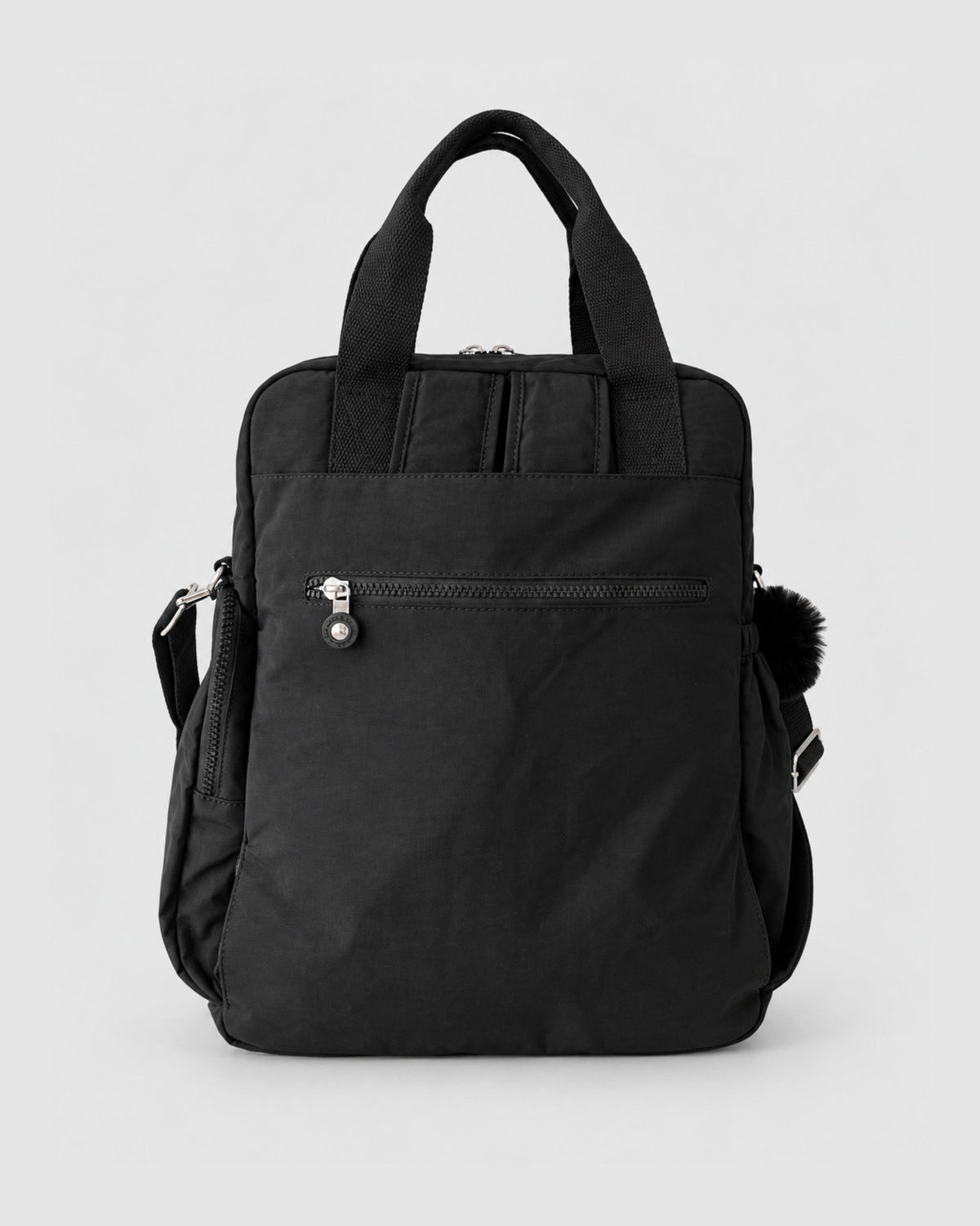 Bolso mochila 3 en 1 de tela nylon con textura de tela mojada, estructurada. Con espacio para laptop de 15.6" 
