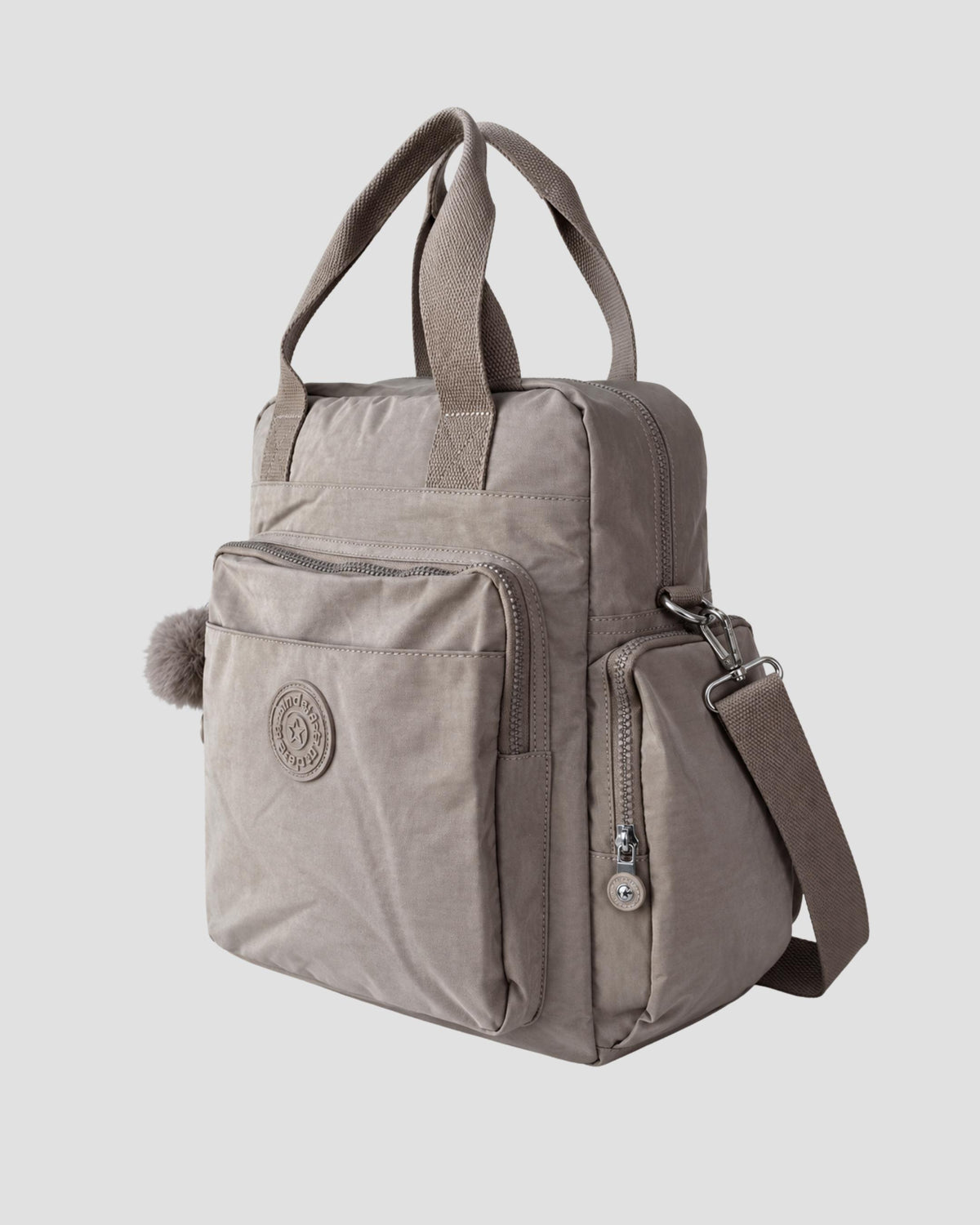 Bolso mochila 3 en 1 de tela nylon con textura de tela mojada, estructurada. Con espacio para laptop de 15.6" 