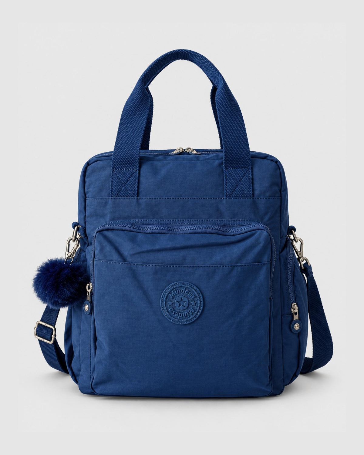 Bolso mochila 3 en 1 de tela nylon con textura de tela mojada, estructurada. Con espacio para laptop de 15.6" 