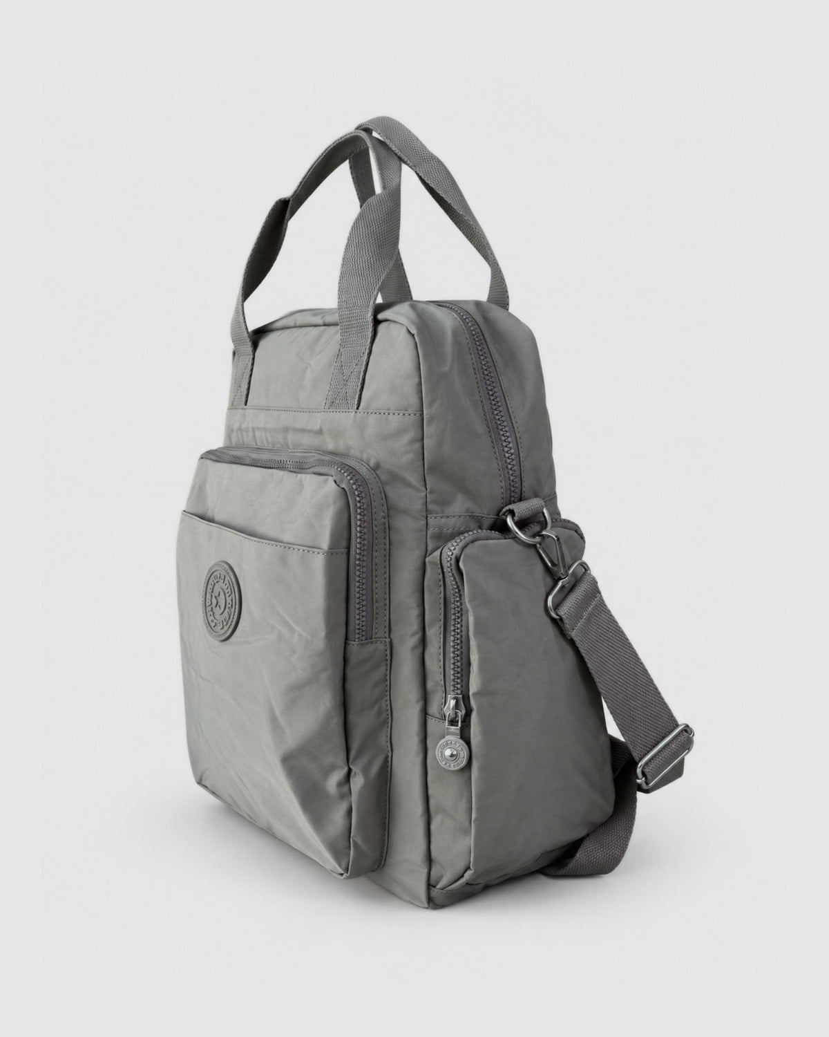 Bolso mochila convertible en tela oxford, tamaño oficio para laptop de 15.6"