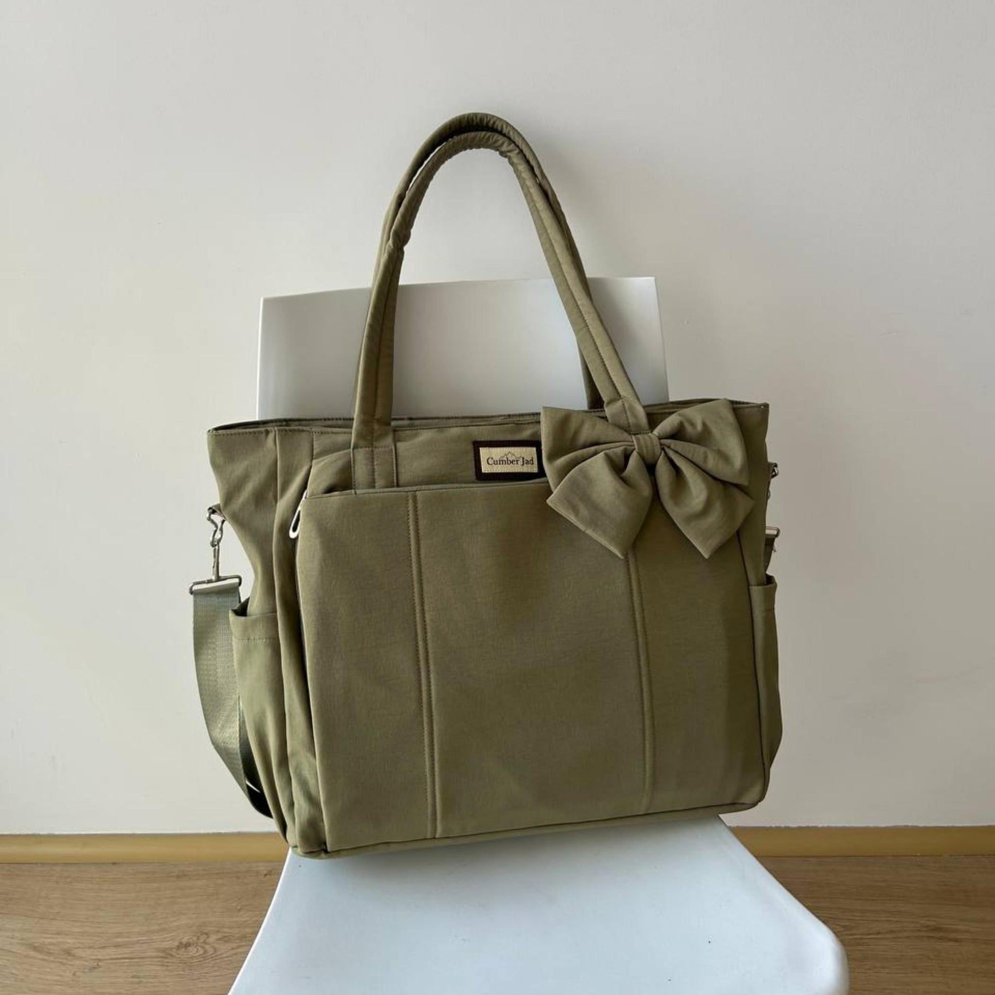 Bolso puffer oficio con lazo