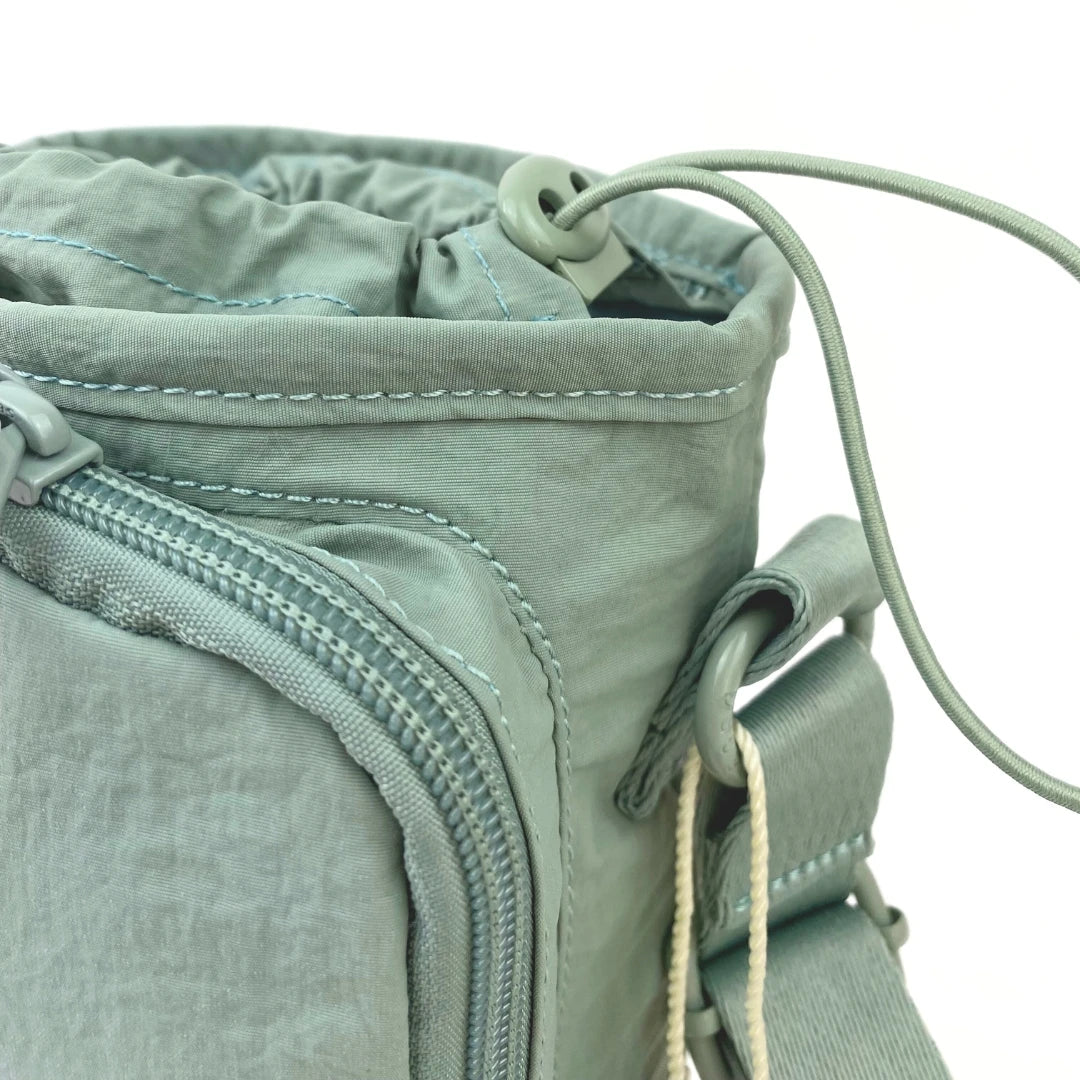 Bobo morral porta botella y celular